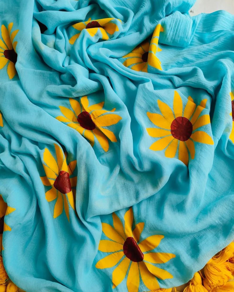 BLUE AND YELLOW COLOR FLORAL SAREE.